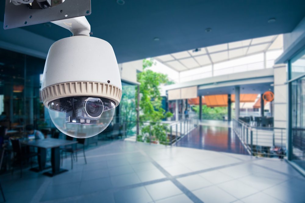 Video surveillance camera in a retail location. Video surveillance equipment may be prone to privacy breaches and should be secured with end-to-end encryption.