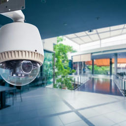 Video surveillance camera in a retail location. Video surveillance equipment may be prone to privacy breaches and should be secured with end-to-end encryption.